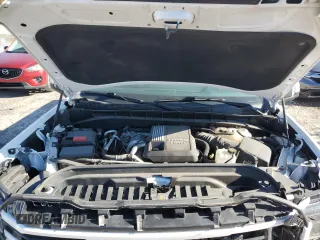 2023 GMC Sierra 1500 AT4 with VIN 3GTUUEE81PG231674, listed as a Copart auction lot 44615465 with 35,569 mi miles and Salvage title. Bid and sale history available at DreamBid. Image 12.