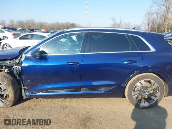 2021 Audi e-tron Premium Plus with VIN WA1LAAGE3MB028896, listed as a IAAI auction lot 41415811 with 39,770 mi miles and . Bid and sale history available at DreamBid. Image 14.