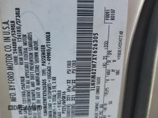 1999 Lincoln Town Car Signature z VIN 1LNHM82W7XY626305, wystawiony jako Copart lot #58009475 z przebiegiem Nie podano mil oraz Szkoda całkowita • Salvage title. Historia ofert i sprzedaży dostępna na DreamBid. Obrazek 12.
