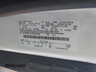 2023 Ford Transit Cargo with VIN 1FTBR2C87PKB38306, listed as a IAAI auction lot 41972454 with 51,049 mi miles and . Bid and sale history available at DreamBid. Image 9.