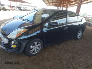 2007 Toyota Prius with VIN JTDKB20U277597719, listed as a IAAI auction lot 42153731 with 148,174 mi miles and . Bid and sale history available at DreamBid. Image 18.