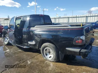 2000 Ford F-150 XL with VIN 2FTRX07L0YCB10621, listed as a Copart auction lot 42147705 with Not provided miles and Salvage title. Bid and sale history available at DreamBid. Image 2.