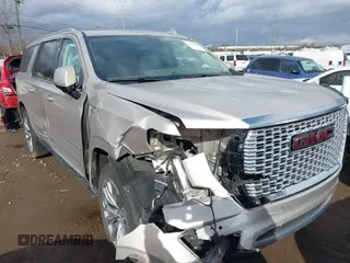 2021 GMC Yukon XL Denali with VIN 1GKS2JKL6MR373274, listed as a IAAI auction lot 41660282 with 88,373 mi miles. Bid and sale history available at carsss.com. Image 1.