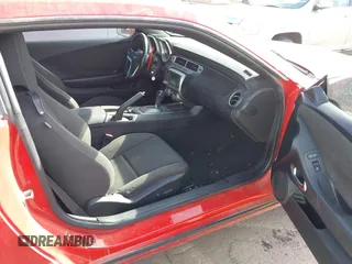 2013 Chevrolet Camaro LT z VIN 2G1FB1E33D9167938, wystawiony jako IAAI lot #41511506 z przebiegiem 204 269 mil mil oraz . Historia ofert i sprzedaży dostępna na DreamBid. Obrazek 5.