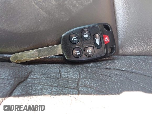 2011 Honda Odyssey Touring with VIN 5FNRL5H97BB073708, listed as a IAAI auction lot 42409164 with 141,986 mi miles and . Bid and sale history available at DreamBid. Image 11.