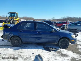 2003 Mitsubishi Lancer ES with VIN JA3AJ26E13U0A3996, listed as a IAAI auction lot 41251250 with 223,311 mi miles. Bid and sale history available at carsss.com. Image 12.