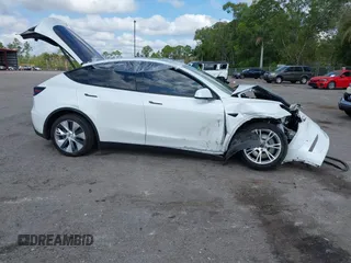 2021 Tesla Model Y Long Range z VIN 5YJYGDEE2MF200315, wystawiony jako IAAI lot #42233599 z przebiegiem 38 742 mil mil oraz . Historia ofert i sprzedaży dostępna na DreamBid. Obrazek 12.
