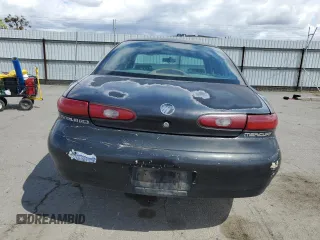 1997 Mercury Sable GS z VIN 1MELM50U1VA620597, wystawiony jako Copart lot #51635765 z przebiegiem 250 824 mil mil oraz Szkoda całkowita • Salvage title. Historia ofert i sprzedaży dostępna na DreamBid. Obrazek 6.