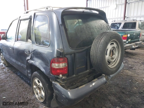 2002 Kia Sportage with VIN KNDJB723X25134499, listed as a IAAI auction lot 41273605 with 1 mi miles. Bid and sale history available at carsss.com. Image 6.