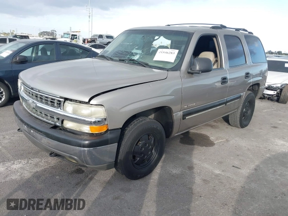 2001 Chevrolet Tahoe LS z VIN 1GNEC13T71R199027, wystawiony jako IAAI lot #41546283 z przebiegiem 232 905 mil mil oraz . Historia ofert i sprzedaży dostępna na DreamBid. Obrazek 2.