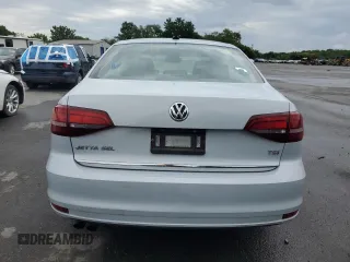 2017 Volkswagen Jetta SEL z VIN 3VWL17AJ6HM412147, wystawiony jako Copart lot #63333085 z przebiegiem Nie podano mil oraz Szkoda całkowita • Salvage title. Historia ofert i sprzedaży dostępna na DreamBid. Obrazek 6.