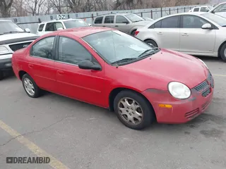 2004 Dodge Neon SXT with VIN 1B3ES56C74D536751, listed as a IAAI auction lot 41760363 with 218,973 mi miles. Bid and sale history available at carsss.com. Image 1.