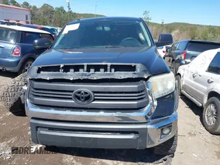 2014 Toyota Tundra 4WD Truck SR5 with VIN 5TFDW5F15EX337114, listed as a IAAI auction lot 41734727 with 209,163 mi miles. Bid and sale history available at carsss.com. Image 12.