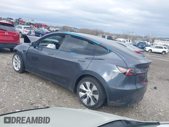 2023 Tesla Model Y Long Range with VIN 7SAYGDEE6PF824173, listed as a IAAI auction lot 41728613 with Not Provided miles and . Bid and sale history available at DreamBid. Image 3.