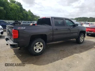 2015 Chevrolet Silverado 1500 LT with VIN 3GCUKREC0FG509688, listed as a Copart auction lot 54199185 with 0 mi miles and Salvage Title. Bid and sale history available at carsss.com. Image 3.