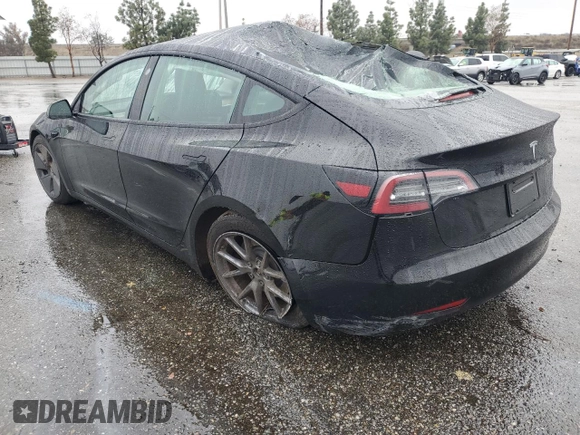 2023 Tesla Model 3 with VIN 5YJ3E1EA2PF671865, listed as a Copart auction lot 45220285 with 29,614 mi miles and Salvage title. Bid and sale history available at DreamBid. Image 2.