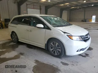 2016 Honda Odyssey Touring Elite with VIN 5FNRL5H91GB070424, listed as a Copart auction lot 55583075 with 115,709 mi miles and Salvage Title. Bid and sale history available at DreamBid. Image 4.