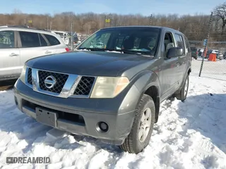2006 Nissan Pathfinder SE with VIN 5N1AR18W56C667660, listed as a IAAI auction lot 41584986 with 241,306 mi miles. Bid and sale history available at carsss.com. Image 2.