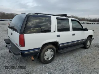 1997 GMC Yukon with VIN 1GKEK13R4VJ700223, listed as a Copart auction lot 49840845 with 231,512 mi miles and Salvage Title. Bid and sale history available at carsss.com. Image 3.