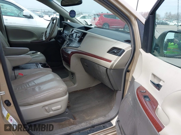 2013 Toyota Sienna XLE with VIN 5TDDK3DC4DS055796, listed as a IAAI auction lot 41993530 with 256,735 mi miles and . Bid and sale history available at DreamBid. Image 5.
