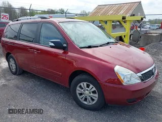 2012 Kia Sedona LX with VIN KNDMG4C71C6493153, listed as a IAAI auction lot 42176426 with 122,375 mi miles. Bid and sale history available at carsss.com. Image 1.