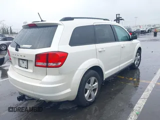 2013 Dodge Journey SE with VIN 3C4PDCAB1DT558033, listed as a IAAI auction lot 41804619 with 204,567 mi miles and . Bid and sale history available at carsss.com. Image 4.