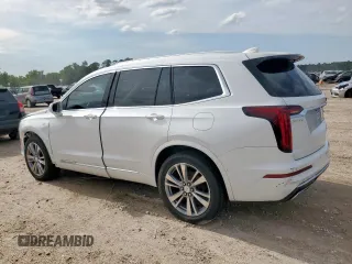 2020 Cadillac XT6 FWD Premium Luxury z VIN 1GYKPCRS9LZ107178, wystawiony jako Copart lot #58789335 z przebiegiem 154 428 mil mil oraz Nie do naprawy. Historia ofert i sprzedaży dostępna na DreamBid. Obrazek 2.