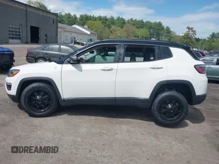 2020 Jeep Compass Trailhawk with VIN 3C4NJDDBXLT189303, listed as a IAAI auction lot 42215585 with 51,453 mi miles and . Bid and sale history available at DreamBid. Image 14.