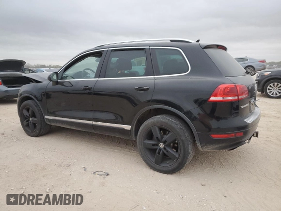2013 Volkswagen Touareg Lux with VIN WVGEF9BP7DD005872, listed as a Copart auction lot 82618654 with 236,650 mi miles and Salvage Title. Bid and sale history available at DreamBid. Image 2.