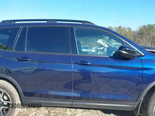 2022 Honda Passport Elite z VIN 5FNYF8H01NB010789, wystawiony jako IAAI lot #41623091 z przebiegiem 17 764 mil mil oraz . Historia ofert i sprzedaży dostępna na DreamBid. Obrazek 14.