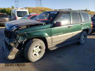 1997 Jeep Grand Cherokee Laredo with VIN 1J4GZ58Y6VC647434, listed as a Copart auction lot 73496824 with 124,946 mi miles and Salvage Title. Bid and sale history available at carsss.com. Image 1.