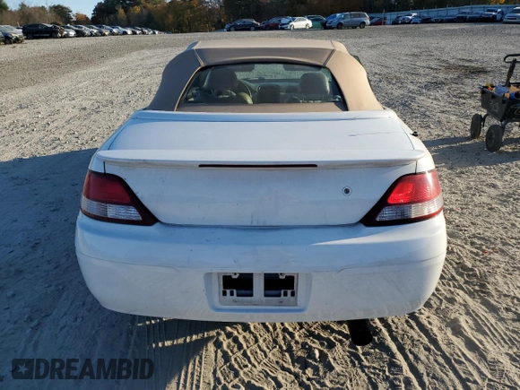 2001 Toyota Solara SE z VIN 2T1FF28P61C474810, wystawiony jako Copart lot #78028704 z przebiegiem 117 214 mil mil oraz Czysty tytuł • Clean title. Historia ofert i sprzedaży dostępna na DreamBid. Obrazek 6.
