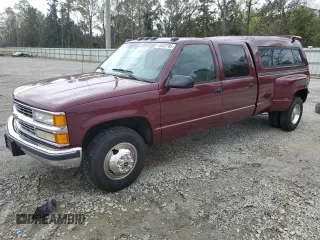 1996 Chevrolet Silverado 3500 z VIN 1GCHC33J4TF013660, wystawiony jako Copart lot #49332785 z przebiegiem 104 424 mil mil oraz Czysty tytuł • Clean title. Historia ofert i sprzedaży dostępna na DreamBid. Obrazek 1.