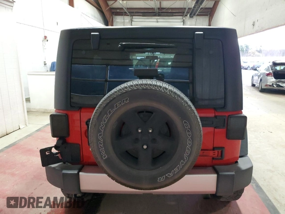 2018 Jeep Wrangler JK Unlimited Sport S with VIN 1C4BJWDG4JL895945, listed as a Copart auction lot 79836184 with 81,287 mi miles and Salvage Title. Bid and sale history available at carsss.com. Image 6.