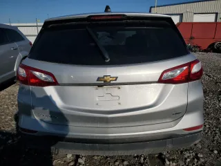 2020 Chevrolet Equinox LS z VIN 3GNAXSEV5LS613851, wystawiony jako Copart lot #49829095 z przebiegiem Nie podano mil oraz Szkoda całkowita • Salvage title. Historia ofert i sprzedaży dostępna na DreamBid. Obrazek 6.