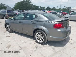 2013 Dodge Avenger R/T with VIN 1C3CDZBG4DN590183, listed as a IAAI auction lot 42178040 with 150,265 mi miles and . Bid and sale history available at carsss.com. Image 3.