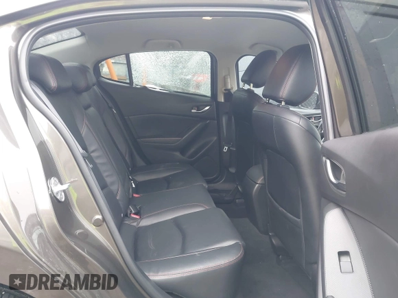 2014 Mazda 3 S Touring with VIN JM1BM1V31E1111499, listed as a IAAI auction lot 41476457 with 109,337 mi miles and . Bid and sale history available at DreamBid. Image 8.