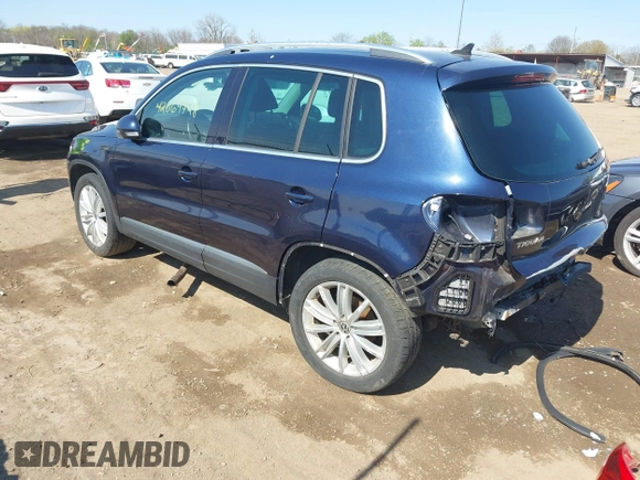 2012 Volkswagen Tiguan S with VIN WVGBV7AX2CW566981, listed as a IAAI auction lot 42069748 with 153,613 mi miles and . Bid and sale history available at DreamBid. Image 3.