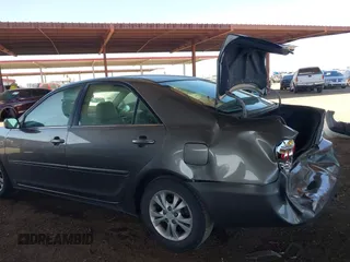 2006 Toyota Camry LE z VIN 4T1BF32K86U635925, wystawiony jako IAAI lot #42267547 z przebiegiem 162 593 mil mil oraz . Historia ofert i sprzedaży dostępna na DreamBid. Obrazek 6.