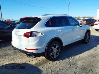 2016 Porsche Cayenne z VIN WP1AA2A2XGKA09945, wystawiony jako IAAI lot #41645654 z przebiegiem 79 327 mil mil oraz . Historia ofert i sprzedaży dostępna na DreamBid. Obrazek 4.