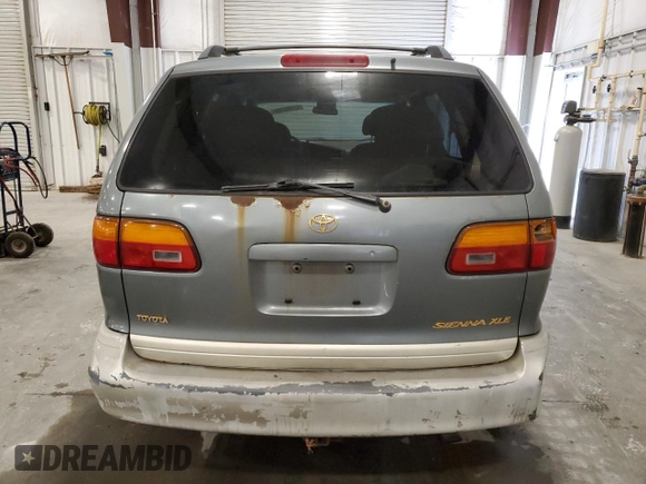 1999 Toyota Sienna LE with VIN 4T3ZF13C2XU123953, listed as a Copart auction lot 52193705 with 174,886 mi miles and Clean Title. Bid and sale history available at carsss.com. Image 6.
