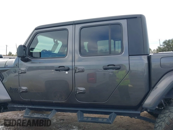 2023 Jeep Gladiator Sport S z VIN 1C6HJTAG9PL554845, wystawiony jako IAAI lot #41312360 z przebiegiem 18 077 mil mil oraz . Historia ofert i sprzedaży dostępna na DreamBid. Obrazek 15.