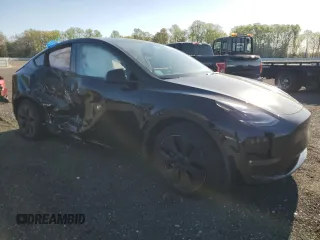 2024 Tesla Model Y Long Range z VIN 7SAYGAEE6RF106267, wystawiony jako Copart lot #53386675 z przebiegiem 8454 mil mil oraz Szkoda całkowita • Salvage title. Historia ofert i sprzedaży dostępna na DreamBid. Obrazek 4.