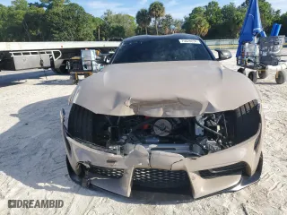 2022 Toyota GR Supra 3.0 with VIN WZ1DB0C0XNW051907, listed as a Copart auction lot 70628834 with 23,012 mi miles and Salvage Title. Bid and sale history available at carsss.com. Image 5.