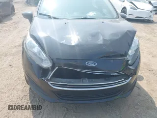 2015 Ford Fiesta S with VIN 3FADP4TJ4FM148740, listed as a IAAI auction lot 42413757 with 77,363 mi miles and . Bid and sale history available at DreamBid. Image 6.