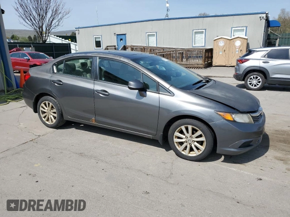 2012 Honda Civic EX with VIN 2HGFB2F83CH311453, listed as a Copart auction lot 55051765 with 242,944 mi miles and Salvage Title. Bid and sale history available at DreamBid. Image 4.