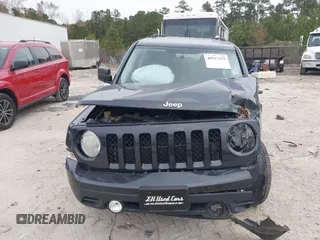 2014 Jeep Patriot Latitude with VIN 1C4NJRFB3ED551622, listed as a IAAI auction lot 40917179 with 109,856 mi miles. Bid and sale history available at carsss.com. Image 12.