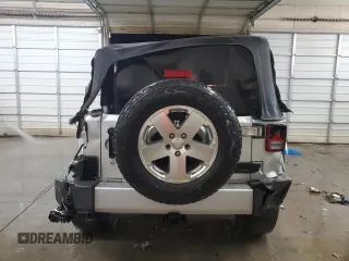 2009 Jeep Wrangler Sahara z VIN 1J4FA54189L789642, wystawiony jako Copart lot #89078145 z przebiegiem 128 902 mil mil oraz Szkoda całkowita • Salvage title. Historia ofert i sprzedaży dostępna na DreamBid. Obrazek 6.