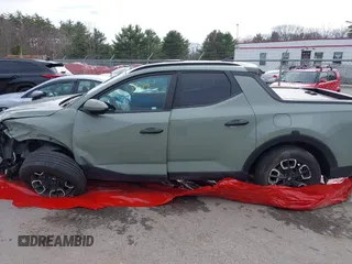 2022 Hyundai Santa Cruz SEL z VIN 5NTJCDAE3NH038055, wystawiony jako IAAI lot #40803108 z przebiegiem 24 208 mil mil oraz . Historia ofert i sprzedaży dostępna na DreamBid. Obrazek 14.
