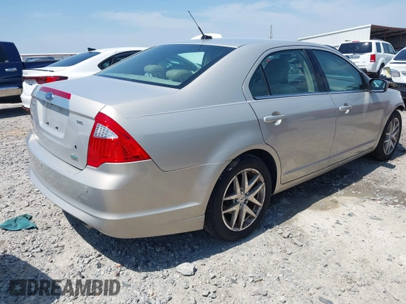 2010 Ford Fusion SEL with VIN 3FAHP0JG6AR282999, listed as a IAAI auction lot 42031162 with 128,001 mi miles and . Bid and sale history available at DreamBid. Image 4.